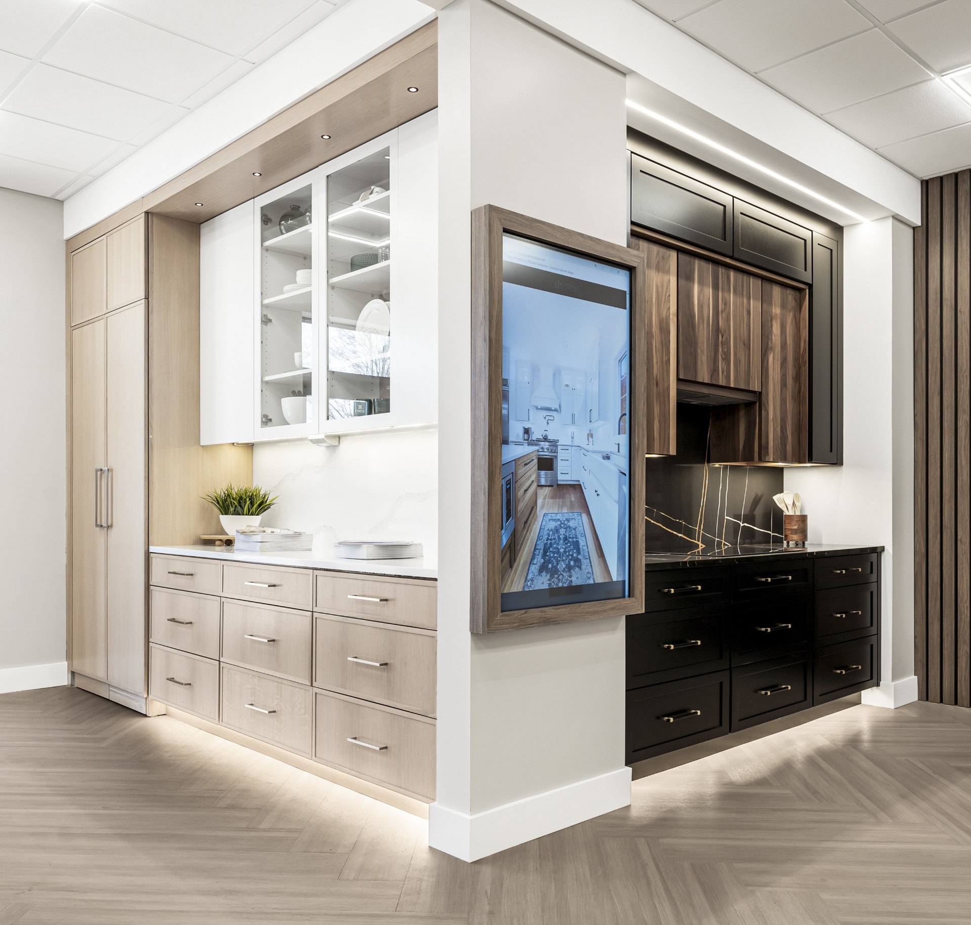 UCD showroom with sample cabinetry and stone slabs